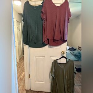 Torrid 3 vneck shirts size 5